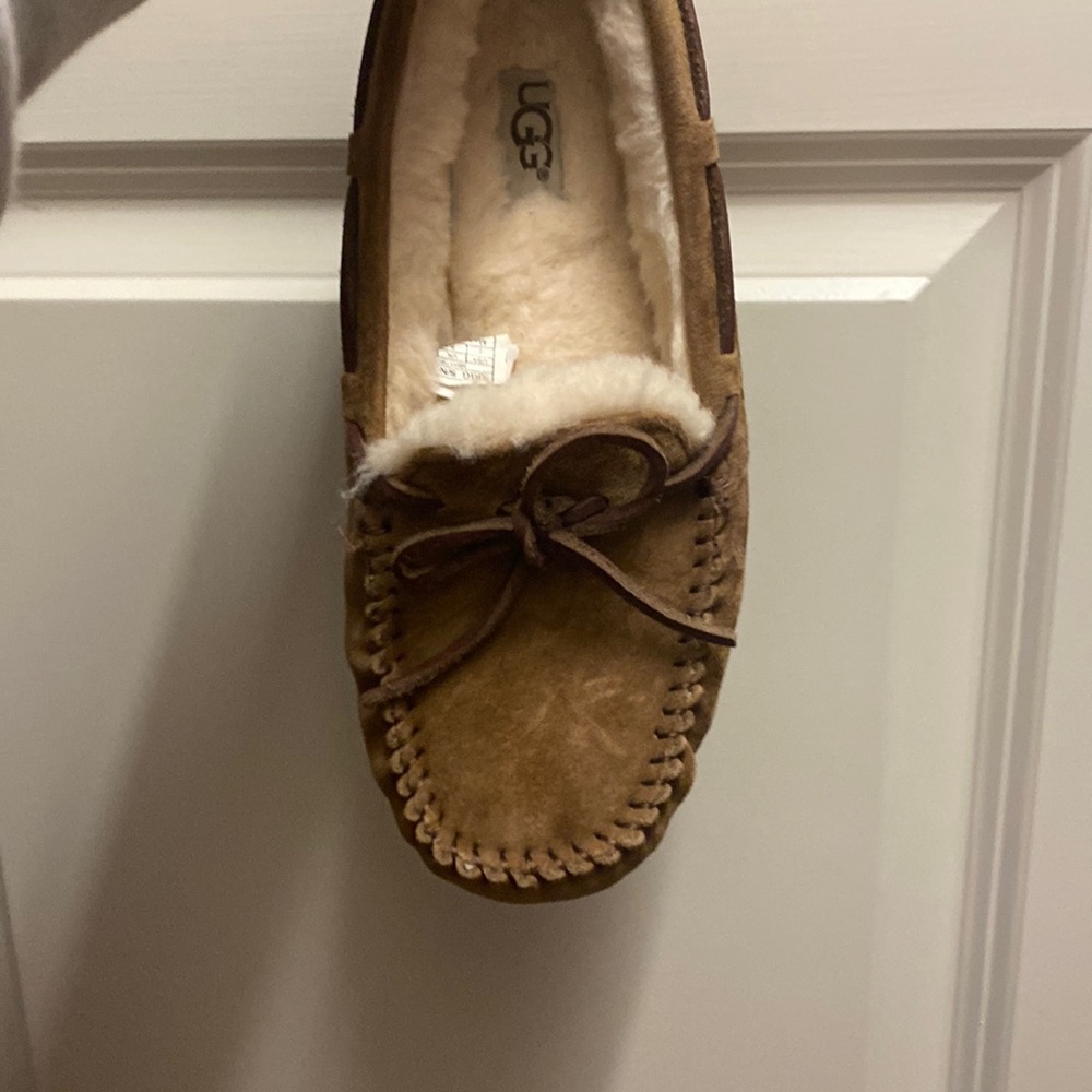 These are brown ugg moccasins womens size 7 in fairly good conditions